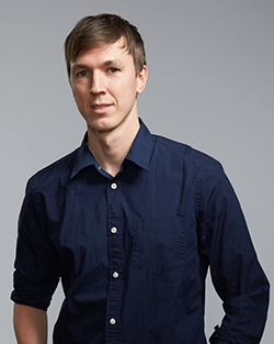 Headshot of J Crowley